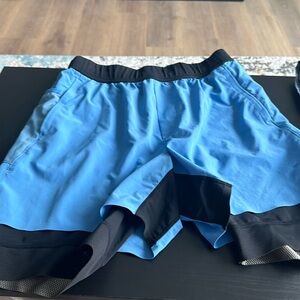 Mens Ten Thousand workout shorts with liner. Size large